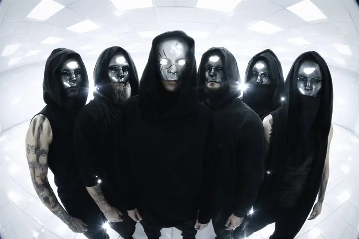 Band photo in a white tunnel